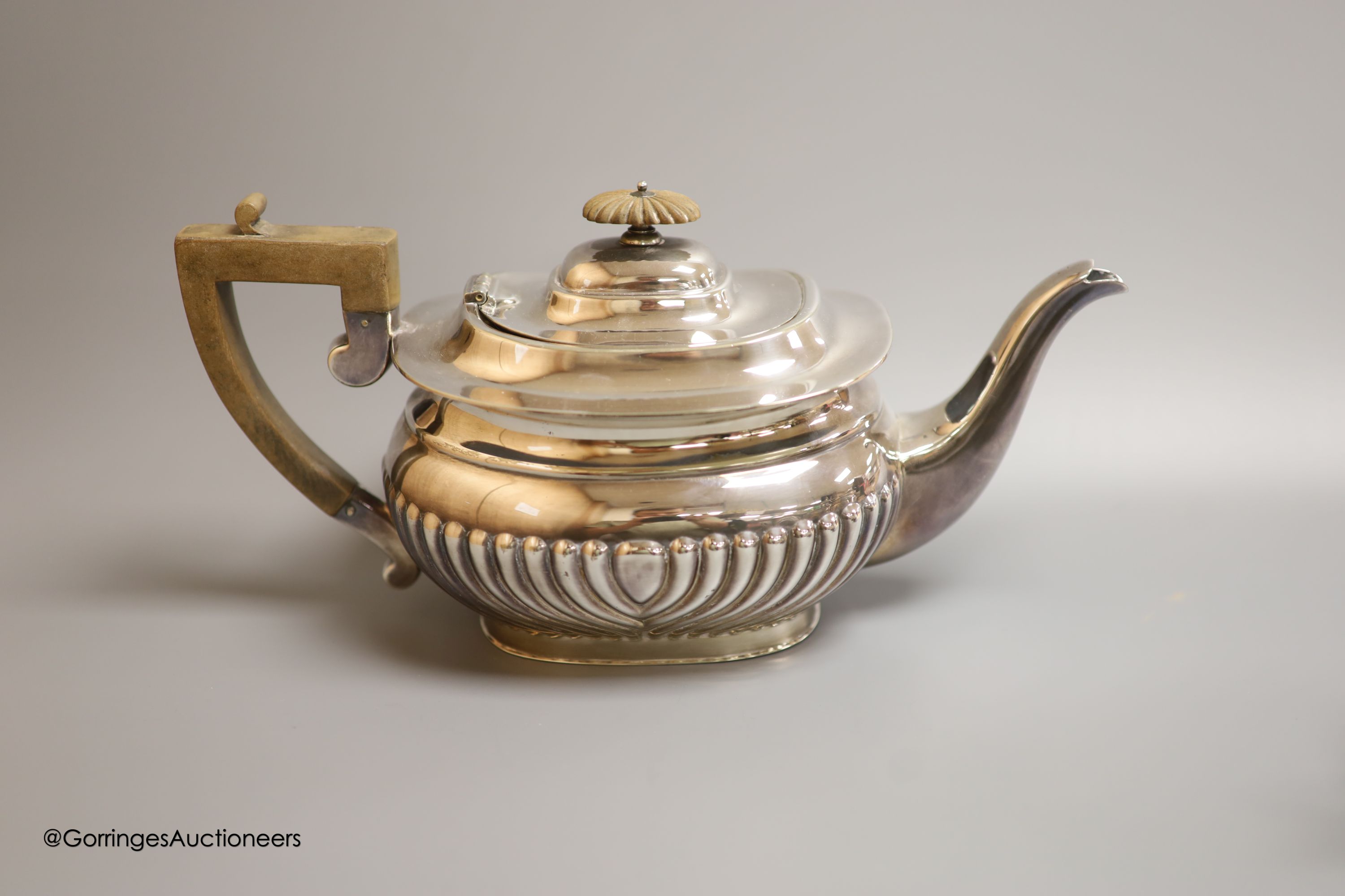 Assorted silver and plated wares including a silver mounted glass scent bottle, London, 1899, a similar cased christening trio, silver pill boxes, teaspoons and vesta case, plated tea set and minor items.